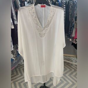 White flowy caftan with jeweled neckline